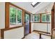 Bright, sunlit entryway featuring wood trim, ample windows, and a skylight at 1530 E 75Th St, Indianapolis, IN 46240