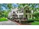 Multi-story home showcasing the exterior, including a deck perfect for outdoor entertaining at 1530 E 75Th St, Indianapolis, IN 46240