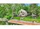 Beautiful two-story home with a spacious deck and access to the water and a tranquil gazebo at 1530 E 75Th St, Indianapolis, IN 46240