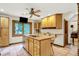 Kitchen featuring an island, ample cabinet space, and a window view at 1530 E 75Th St, Indianapolis, IN 46240