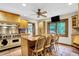 Traditional kitchen with an island, stainless steel appliances, and cozy breakfast bar at 1530 E 75Th St, Indianapolis, IN 46240