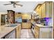 Open kitchen showcasing stainless appliances, island seating, and ample counter space at 1530 E 75Th St, Indianapolis, IN 46240