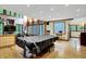Spacious living room with hardwood floors, bright windows, and recessed lighting at 1530 E 75Th St, Indianapolis, IN 46240