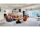Spacious living room with hardwood floors, comfortable seating and large windows at 1530 E 75Th St, Indianapolis, IN 46240