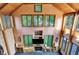 Stunning living room with high ceilings, a fireplace, and plenty of natural light at 1530 E 75Th St, Indianapolis, IN 46240