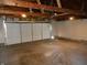 Spacious garage with automatic overhead door and overhead lighting at 1545 Finley Ave, Indianapolis, IN 46203