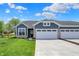 Charming single-story home featuring a two-car garage, well-manicured lawn, and attractive curb appeal at 1639 Clover Crossing Dr, Greenfield, IN 46140
