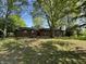 Spacious backyard featuring a picnic table, offering a relaxing outdoor space at 1725 E 100 S, Lebanon, IN 46052