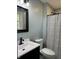Bathroom with sleek vanity and shower with patterned curtain at 1725 E 100 S, Lebanon, IN 46052