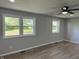 Bedroom with neutral paint, ceiling fan and natural light from large windows at 1725 E 100 S, Lebanon, IN 46052