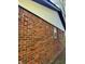Red brick siding on a building offering timeless appeal and low maintenance at 1725 E 100 S, Lebanon, IN 46052