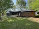 Charming single-story brick home with an attached garage and inviting front porch at 1725 E 100 S, Lebanon, IN 46052