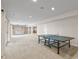 Large basement recreation room featuring plush carpets, and versatile space for various activities at 1832 Live Oak Ct, Avon, IN 46123