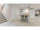 Finished basement with kitchenette, bar seating, and rec space, perfect for entertaining at 1832 Live Oak Ct, Avon, IN 46123