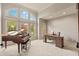 Well lit home office space with large windows, grand piano and executive desk at 1832 Live Oak Ct, Avon, IN 46123