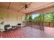 Relaxing screened porch with ceiling fan and comfortable seating, perfect for enjoying the outdoors at 1832 Live Oak Ct, Avon, IN 46123