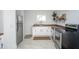 Updated kitchen featuring modern stainless steel appliances, sleek countertops, and ample cabinet space at 1912 Broadway St, Anderson, IN 46012