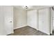 Basement with ample closet space, modern vinyl flooring and neutral paint at 1944 Galeston Ct, Indianapolis, IN 46229