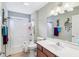 Full bathroom features a tub and shower combo, single sink vanity and tiled floors at 217 Devonshire Ct, Anderson, IN 46013