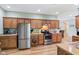 Spacious kitchen features stainless steel appliances, countertops, and abundant cabinet space at 217 Devonshire Ct, Anderson, IN 46013