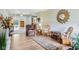Open-concept living room featuring wood floors and stylish decor accents at 217 Devonshire Ct, Anderson, IN 46013
