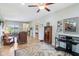 Spacious living room featuring an open layout with hardwood floors and ample lighting at 217 Devonshire Ct, Anderson, IN 46013