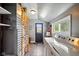 Bright laundry area featuring a modern washer and dryer and a tiled floor at 218 Pearl St, Fortville, IN 46040