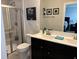 Bathroom features tiled stand-up shower, toilet, and vanity with double sinks at 230 Kiawah Dr, Whiteland, IN 46184
