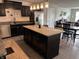Spacious kitchen featuring a large island, modern appliances, and an open layout at 230 Kiawah Dr, Whiteland, IN 46184