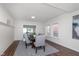 Traditional dining room with neutral colored walls and gray dining set with six chairs at 2442 Guilford Ave, Indianapolis, IN 46205