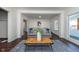 Comfortable living room showcasing stylish furnishings, a cozy sofa, and ample space for relaxation at 2442 Guilford Ave, Indianapolis, IN 46205