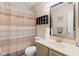 Bathroom featuring a shower with a patterned curtain, plus an olive-green vanity at 2922 Amherst St, Indianapolis, IN 46268