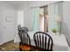 This dining room showcases a sliding door and a table with four chairs at 2922 Amherst St, Indianapolis, IN 46268