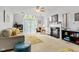 Spacious living room with vaulted ceiling, fireplace, and lots of natural light at 2922 Amherst St, Indianapolis, IN 46268