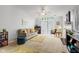 Bright living room boasts vaulted ceilings, neutral decor, and natural light at 2922 Amherst St, Indianapolis, IN 46268