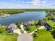 Luxurious waterfront properties, featuring meticulously manicured lawns and private docks at 3107 Waterfront Cir, Anderson, IN 46012