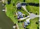 Lakeside homes feature expansive lawns and private docks, blending luxury with natural beauty at 3107 Waterfront Cir, Anderson, IN 46012