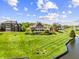 Picturesque view of the backyard leading to the waterfront with beautiful lawns at 3107 Waterfront Cir, Anderson, IN 46012