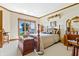Comfortable bedroom with lake views, cozy decor, and ample natural light at 3107 Waterfront Cir, Anderson, IN 46012