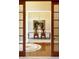 Elegant dining room with chandelier, decorative painting, and seating for six, perfect for formal gatherings at 3107 Waterfront Cir, Anderson, IN 46012