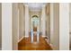 Spacious foyer with gleaming hardwood floors and decorative rug welcomes you into this beautifully designed home at 3107 Waterfront Cir, Anderson, IN 46012