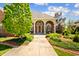 Front entrance featuring a stone walkway with manicured landscaping at 3107 Waterfront Cir, Anderson, IN 46012
