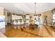 Eat-in kitchen features a large island, barstool seating, and a cozy dining area at 3107 Waterfront Cir, Anderson, IN 46012