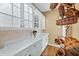 Butler's pantry with glass front cabinets and ample storage at 3107 Waterfront Cir, Anderson, IN 46012