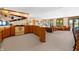 Spacious open kitchen leading into a comfortable living area with natural light and scenic lake views at 3107 Waterfront Cir, Anderson, IN 46012