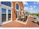 Outdoor seating on a deck with a view of the lake, with ample space for outdoor entertaining and dining at 3107 Waterfront Cir, Anderson, IN 46012