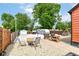 Backyard space featuring a gravel area, fire pit, and storage shed at 3302 N Gladstone Ave, Indianapolis, IN 46218