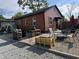 Backyard patio and sitting area with a fire pit, perfect for outdoor entertaining and summer evenings at 3302 N Gladstone Ave, Indianapolis, IN 46218