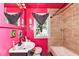 Vibrant bathroom featuring a single sink vanity and shower/tub combo at 3302 N Gladstone Ave, Indianapolis, IN 46218