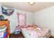 This bedroom has a window and storage at 3302 N Gladstone Ave, Indianapolis, IN 46218